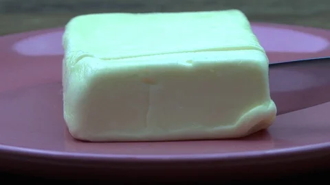 Knife cutting butter Stock-Footage 79312310