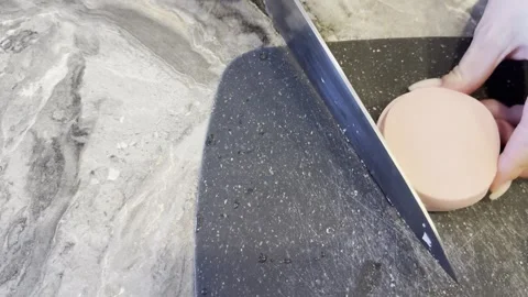 A knife is cutting a tomato Stock Footage 279053406