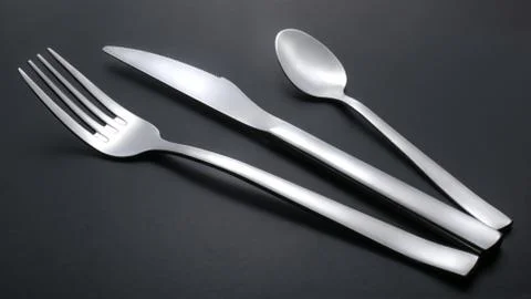 Knife, fork and teaspoon Stock Photos