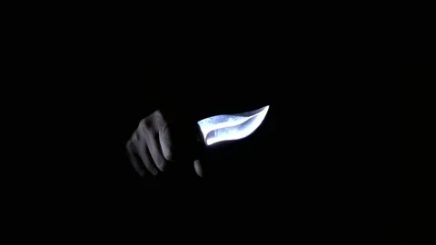 Knife in hand, ghost in the dark. Stock Footage 166605941