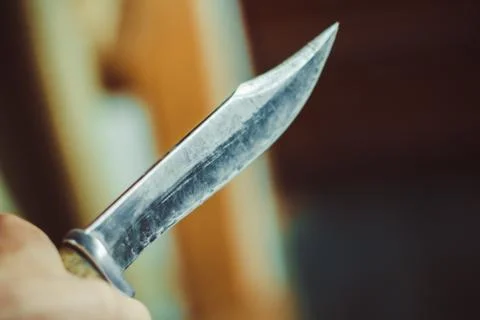 Knife in hand Photos