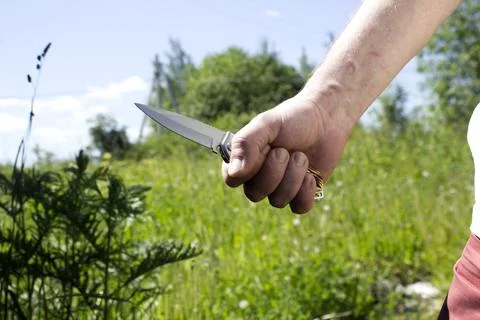 Knife in the hands Stock Photos