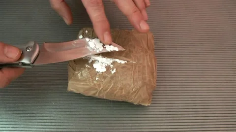 Knife opened the package and found a drug Video stock 21287859
