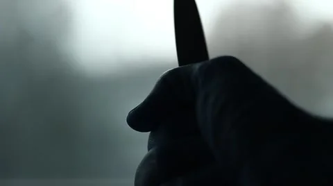 A knife in the palm hand Stock Footage 61341540