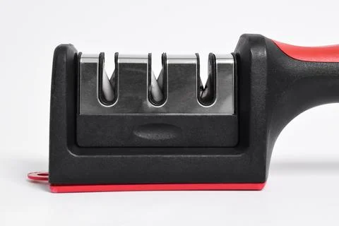 Knife Sharpener isolated on white background. Manual knife sharpening, Kitche Stock Photos