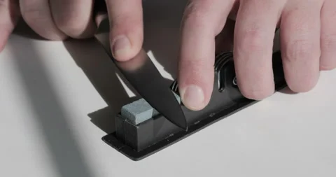 Knife sharpening Stock Footage 234968315