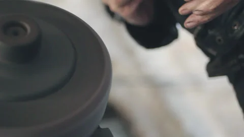 Knife sharpening on moving machine Stock Footage 289071629