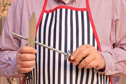 Knife sharpening Stock Photos