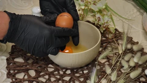 Knife-Sliced Egg Poured into Ceramic Dish Stock Footage 311318392