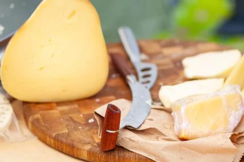 Knife for slicing cheese. Stock Photos
