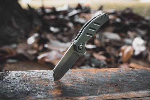 Knife Stabbed into a Weathered box Stock Photos