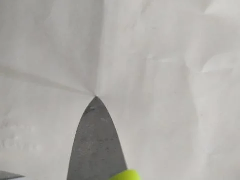 Knife through the paper Stock Photos