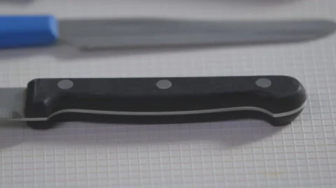 Knife on a white surface Stock Footage 64018809