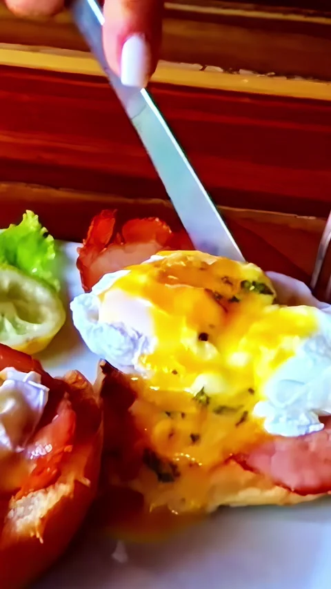 Knife will glide across the side, where the golden yellow juices hide Stock Footage 337207773