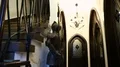 Knight in armor standing in murky hall, entrance to historical museum, tourism HD Footage