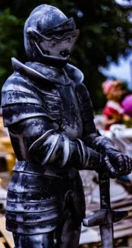 Knight in armor with a sword Stock Photos