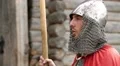 Knight in armours with spears guards the fortress and sings a song HD Footage