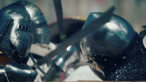 Knight during battle. Close-up on eyes and helmet Stock Footage