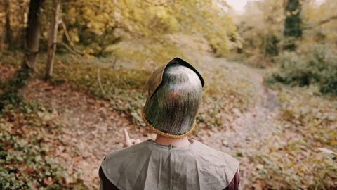 Knight in a forest looking around Stock Footage 130264551