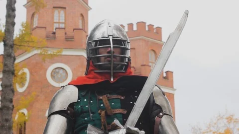 Knight guards and speaks on the security mobile  phone   technology Stock Footage 117807241