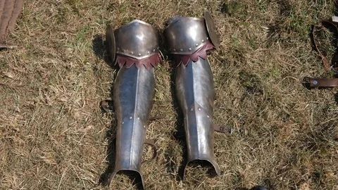 Knight legs armor on grass Stock Footage 113186769