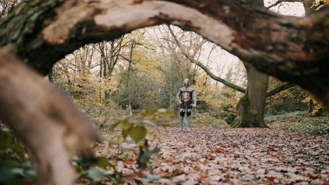 Knight lifting his visor while holding a scroll Stock Footage 130260666