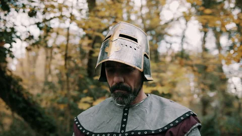 Knight looking down and shaking his head Stock Footage 130262848