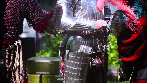Knight in metal armor Stock Footage 74421871