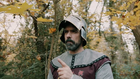 Knight pointing and nodding in a forest Stock Footage 130262438