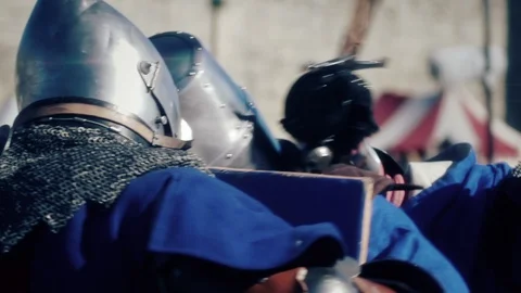 Knight preparing for war. Close-up on eyes and helmet Stock Footage 86557821