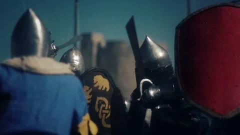 Knight preparing for war. Close-up on eyes and helmet Stock Footage 86557863