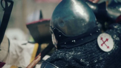 Knight preparing for war. Close-up on eyes and helmet Stock Footage 101651230