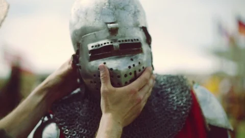 Knight preparing for war. Close-up on eyes and helmet Stock Footage 101651983