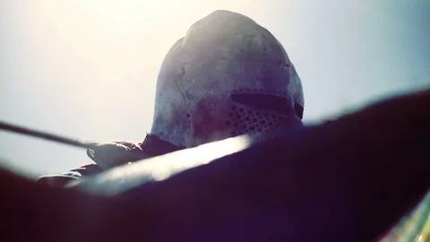 Knight preparing for war. Close-up on eyes and helmet Stock Footage 101652020