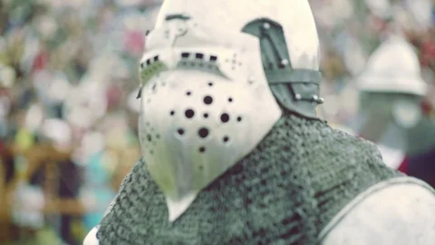 Knight preparing for war. Close-up on eyes and helmet Stock Footage 101652085