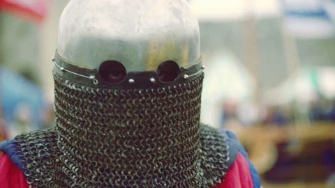 Knight preparing for war. Close-up on eyes and helmet Stock Footage 101652143