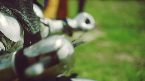 Knight preparing for war. Close-up on sword and helmet Stock Footage 101651978