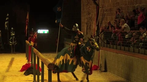 Knight riding with flag Stock Footage 43149382