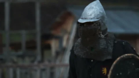 Knight tournament. Two opponents in medieval clothes and steel armor fighting Video stock 60749005