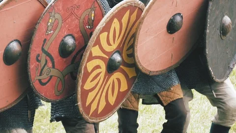 Knight warriors marching forward, shield wall. Medieval soldiers in full armor 스톡 동영상 112866606