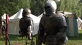 Knight's armor dolly at medieval pageant event HD Footage