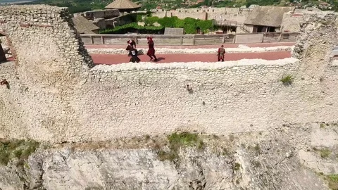 Knights practicing in a castle Stock Footage 115926563