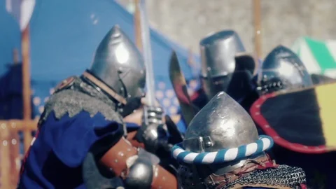 Knights preparing for war. Close-up on eyes and helmet Video stock 86557883
