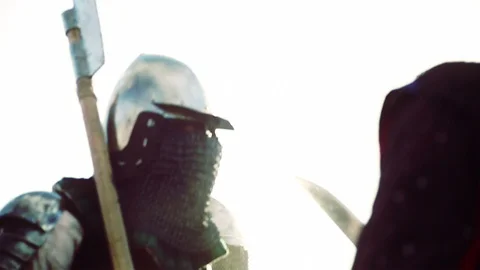 Knights preparing for war. Close-up on eyes and helmets Stock Footage 101652224