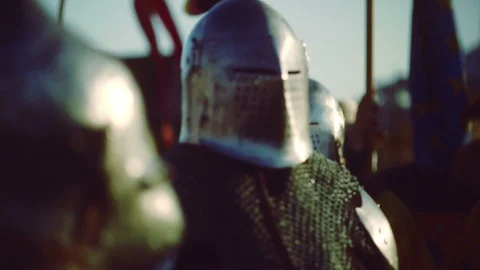 Knights preparing for war. Close-up on eyes and helmets Stock Footage 101652535
