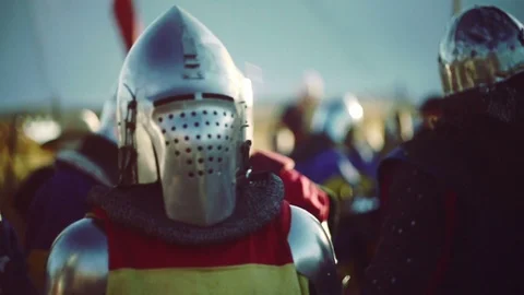 Knights preparing for war. Close-up on eyes and helmets Stock Footage 101652549