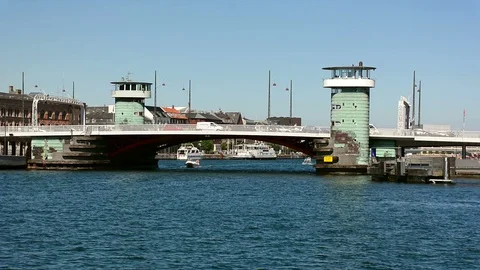 Knippel Bridge, a bascule bridge across the Inner Harbour of Copenhagen Stock Footage 99997673