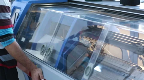 Knit machine working with superviser Stock Footage 61829075