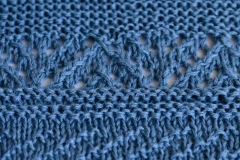 Knit openwork and horizontal patterns of natural wool blue Stock Photos