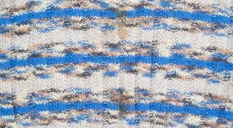 Knit pattern. Close up background of knitted. Stock Photos
